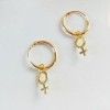Gold woman symbol hoop earrings