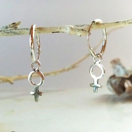 Silver woman symbol hoop earrings