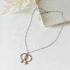 Double woman symbol necklace silver