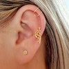 Gold-plated sterling silver branches ear cuff.